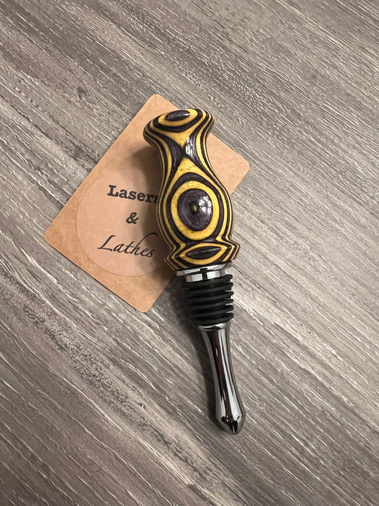 Yellow and Black Spectra Ply Wine Stopper